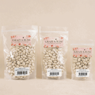 Milkybar almonds in resealable pouch, white chocolate coated almonds luxury